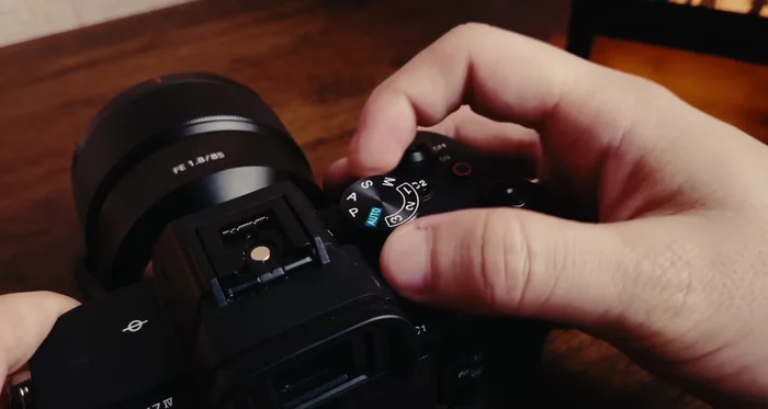 Maintain a shutter speed of double your frame rate (e.g., 1/50th for 24fps) for natural motion blur. Adjust aperture for desired depth of field (f/4-f/8 usually optimal). Keep ISO as low as possible to minimize noise.