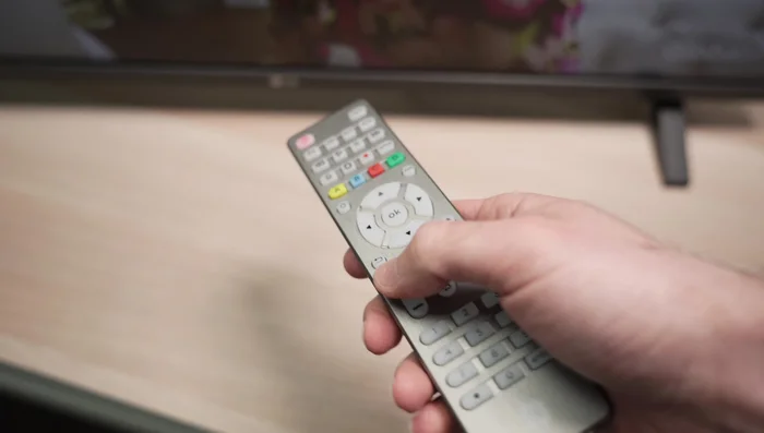 Press the device button again to store the code.