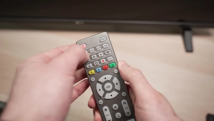 Press the device button again to store the code.