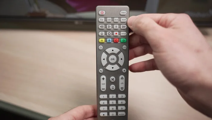 Press the corresponding device button (TV, Cable Box, DVD, Audio).