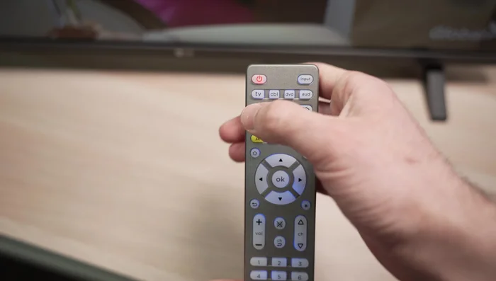 Press the corresponding device button (TV, Cable Box, DVD, Audio).