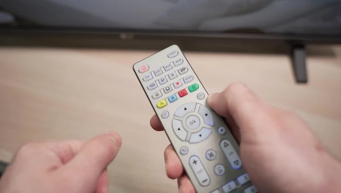 Press the device button again to store the code.
