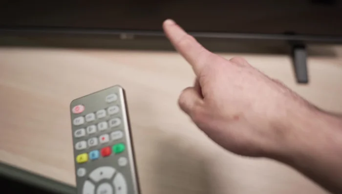 Press the device button again to store the code.