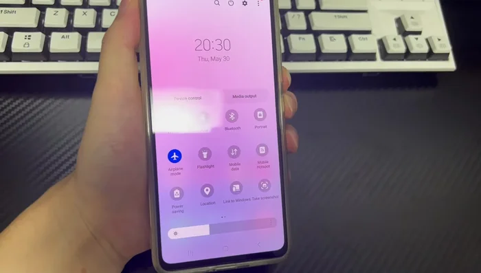 Press and hold the combination of keys that force restart your phone (e.g., Power button and Volume down button for Samsung).